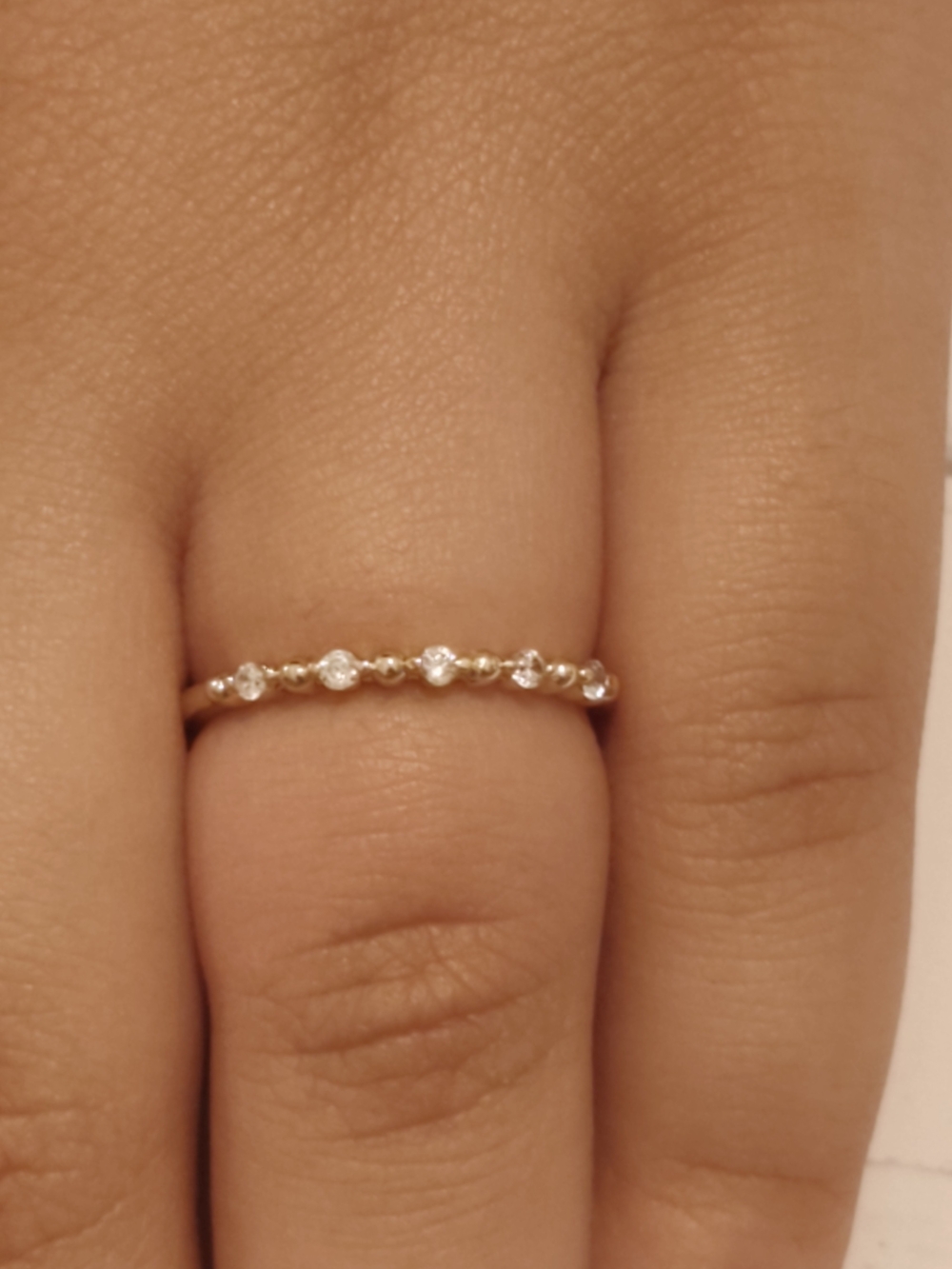 The surface is plated with a thin layer of real gold 14k. Size 7
